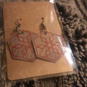 Homemade wooden earrings in matte red